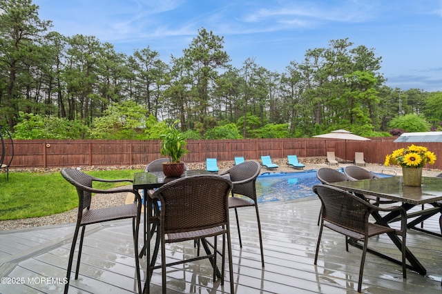 476 Birch Bark Dr, Brick, NJ 08723 - fenced backyard featuring outdoor dining area and a deck