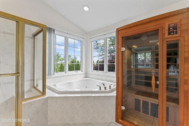 full bath featuring vaulted ceiling, a jetted tub, a sauna / steam room, and an enclosed shower
