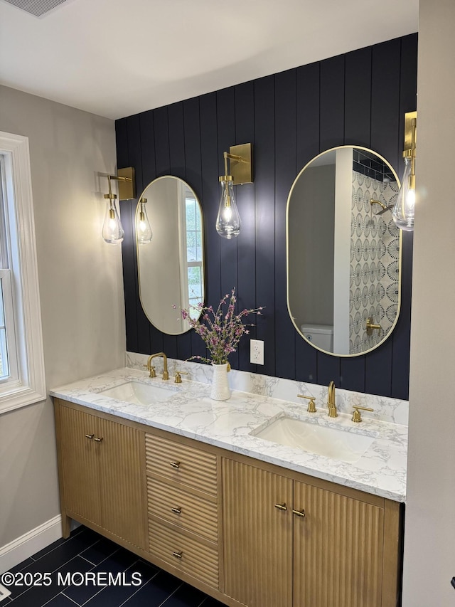 983 Cedar Grove Rd, Toms River, NJ 08753 - bathroom featuring double vanity, tile patterned floors, and baseboards