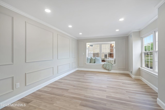 983 Cedar Grove Rd, Toms River, NJ 08753 - unfurnished room with crown molding, light wood-type flooring, recessed lighting, baseboards, and a decorative wall