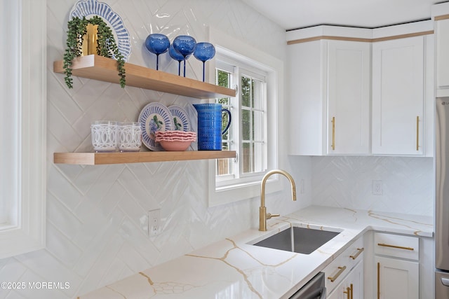 983 Cedar Grove Rd, Toms River, NJ 08753 - kitchen featuring a sink, open shelves, white cabinetry, and backsplash