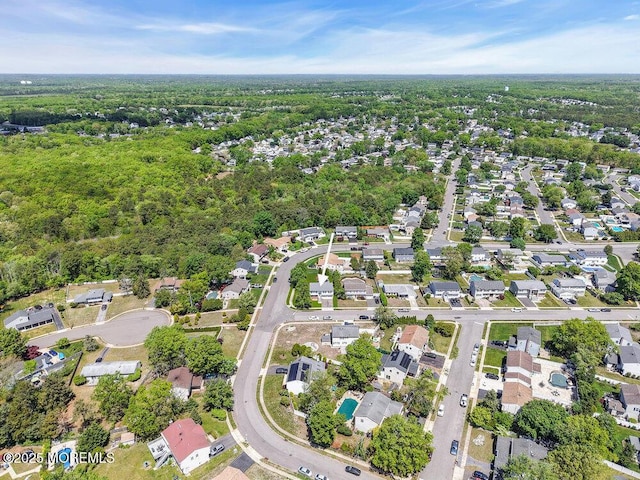 22 Orchard Ct, Howell, NJ 07731 - aerial view of property and surrounding area with nearby suburban area and a heavily wooded area