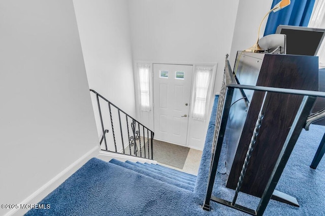 22 Orchard Ct, Howell, NJ 07731 - carpeted entryway featuring baseboards and a high ceiling