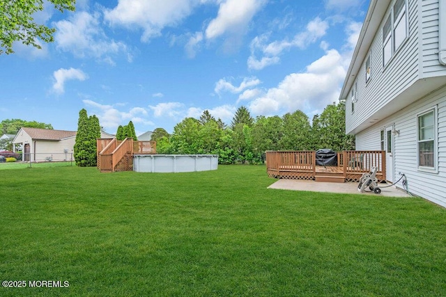 22 Orchard Ct, Howell, NJ 07731 - view of yard with a deck and an outdoor pool