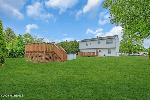 22 Orchard Ct, Howell, NJ 07731 - rear view of house featuring a deck and stairway