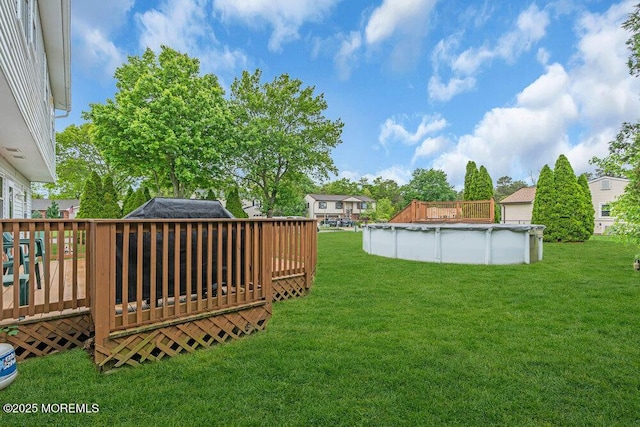 22 Orchard Ct, Howell, NJ 07731 - view of grassy yard with a deck