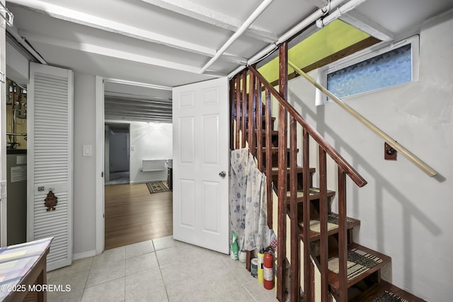 365 John St, South Amboy, NJ 08879 - staircase featuring tile patterned floors and baseboards