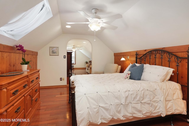 39 Snowdrift Ln, Howell, NJ 07731 - bedroom featuring lofted ceiling, wood finished floors, wood walls, and ceiling fan