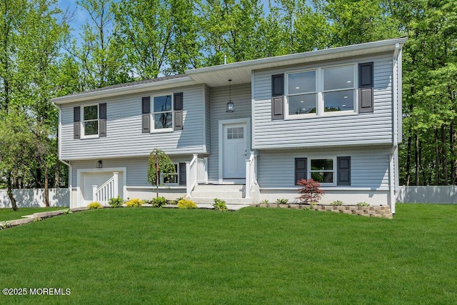 bi-level home featuring an attached garage