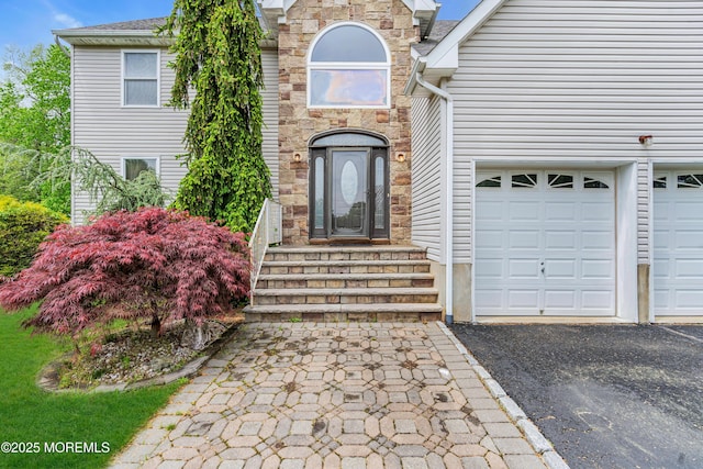 doorway to property with driveway