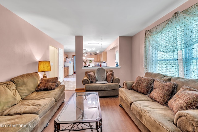 living area with light wood-style flooring