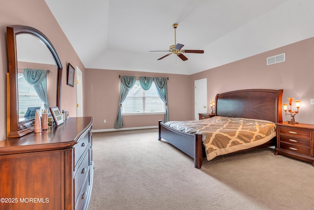 carpeted bedroom with lofted ceiling, baseboards, and ceiling fan