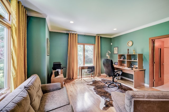 office space featuring crown molding, wood finished floors, recessed lighting, and baseboards