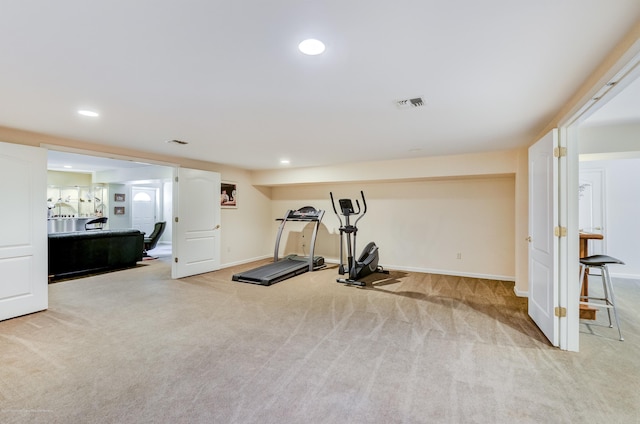 workout area featuring carpet, recessed lighting, and baseboards