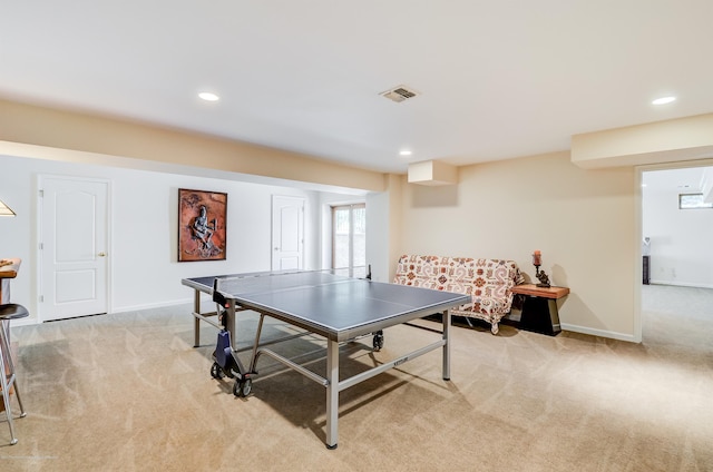 game room featuring light carpet, recessed lighting, and baseboards