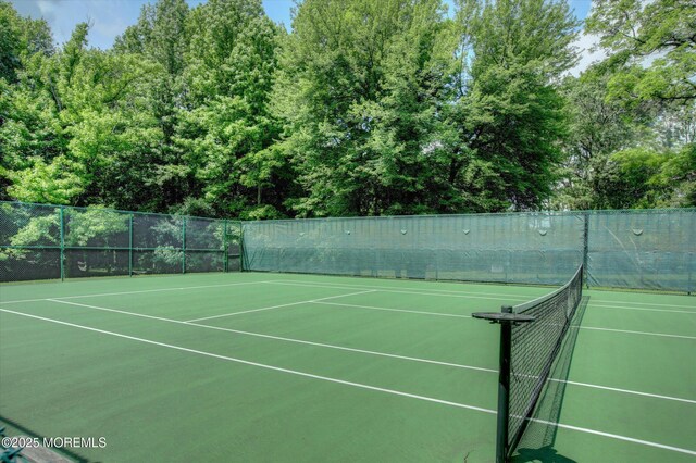 7 Mccampbell Rd, Holmdel, NJ 07733 - view of tennis court with community basketball court