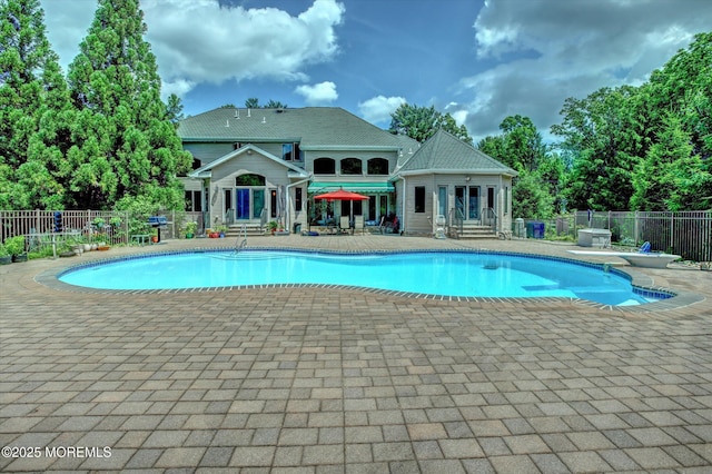 7 Mccampbell Rd, Holmdel, NJ 07733 - view of swimming pool featuring a patio and a diving board