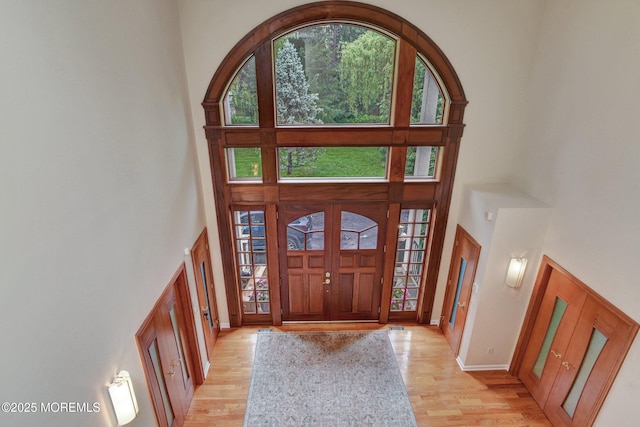 7 Mccampbell Rd, Holmdel, NJ 07733 - foyer with a high ceiling, light wood-style floors, and baseboards