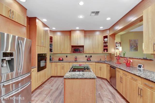 7 Mccampbell Rd, Holmdel, NJ 07733 - kitchen featuring black appliances, light brown cabinets, a sink, a kitchen island, and dark stone countertops