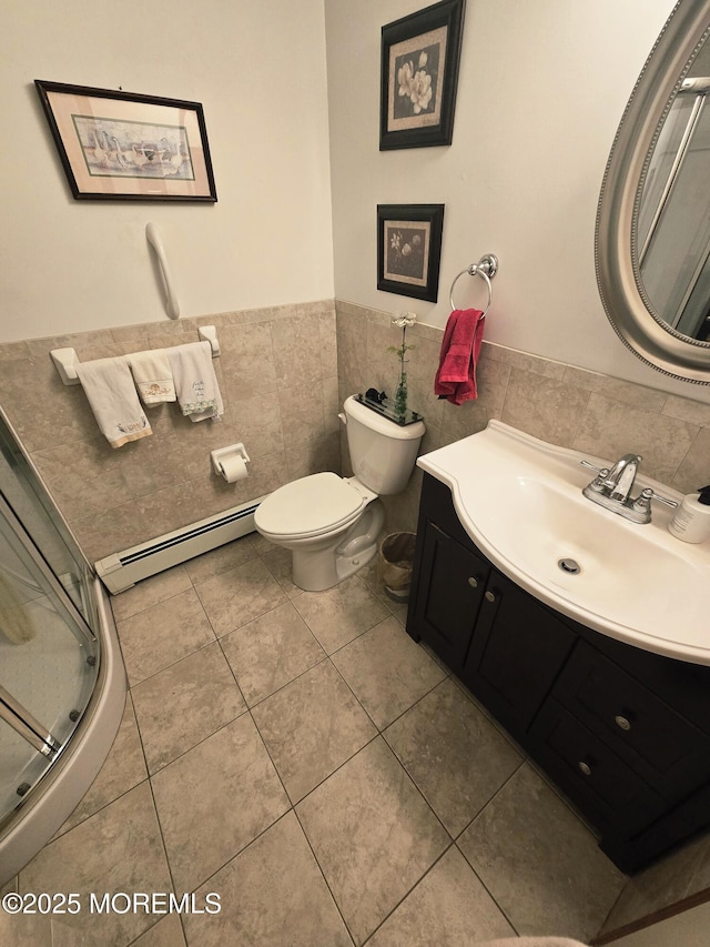 804 Brookside Dr, Toms River, NJ 08753 - full bath with a baseboard radiator, vanity, toilet, tile walls, and wainscoting