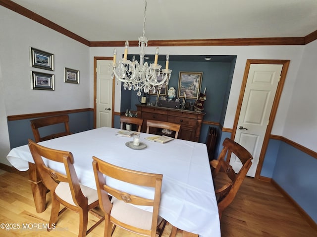 804 Brookside Dr, Toms River, NJ 08753 - dining area featuring a chandelier, light wood finished floors, baseboards, and crown molding