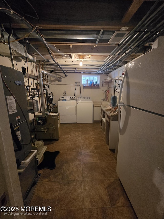804 Brookside Dr, Toms River, NJ 08753 - below grade area with freestanding refrigerator and washer and clothes dryer
