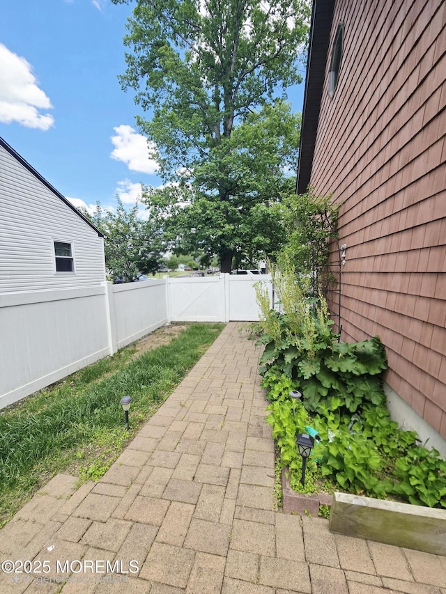 804 Brookside Dr, Toms River, NJ 08753 - fenced backyard with a patio area