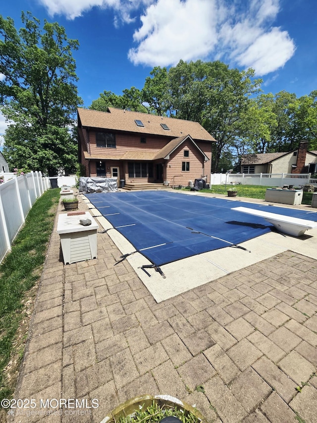804 Brookside Dr, Toms River, NJ 08753 - view of pool with a patio area, a diving board, and a fenced backyard