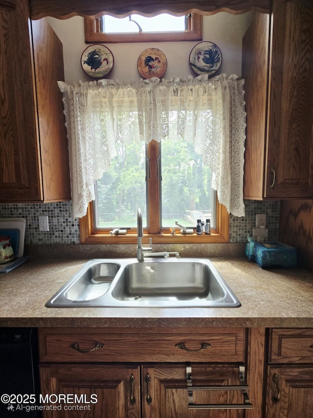 804 Brookside Dr, Toms River, NJ 08753 - kitchen featuring a sink, backsplash, and black dishwasher