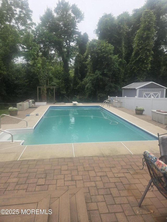 804 Brookside Dr, Toms River, NJ 08753 - view of swimming pool featuring a patio area and a diving board