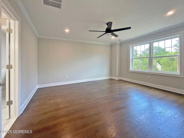 empty room with ornamental molding, baseboards, dark wood-type flooring, ceiling fan, and recessed lighting
