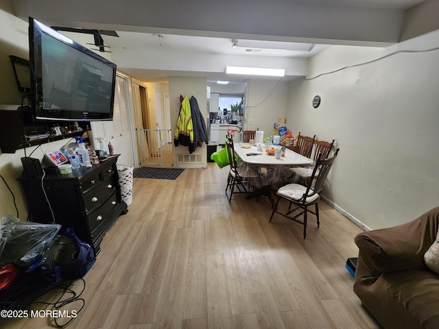 1102 Sawmill Rd Unit 99, Brick, NJ 08724 - dining space with light wood-style flooring and baseboards