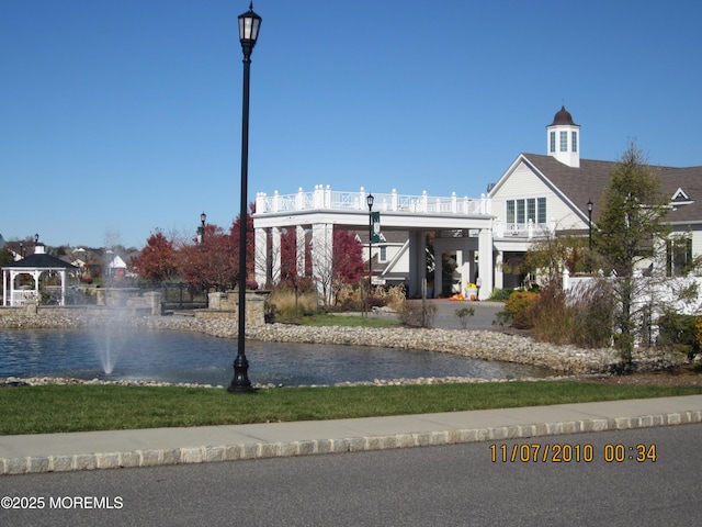 view of building exterior featuring a water view