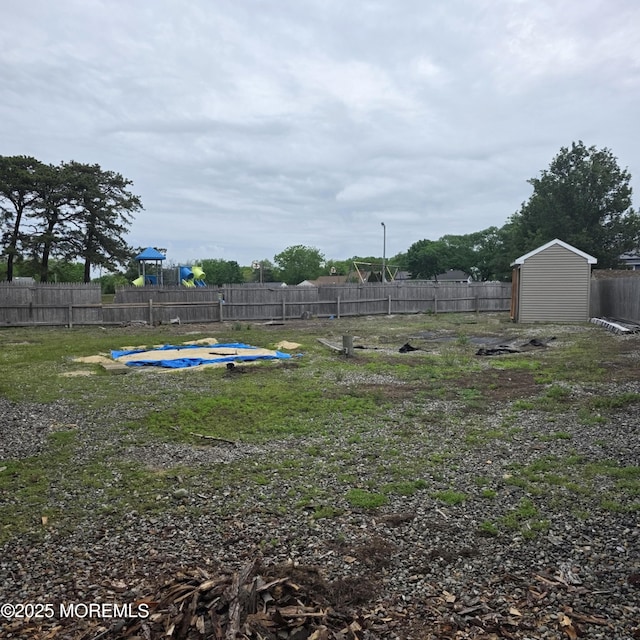 56 Georgetown Blvd, Barnegat, NJ 08005 - view of yard featuring a storage shed, fence, and an outbuilding