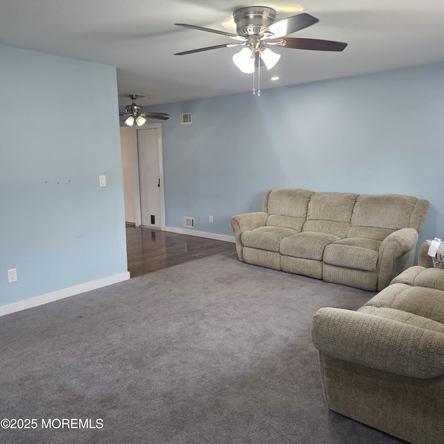 56 Georgetown Blvd, Barnegat, NJ 08005 - carpeted living area with a ceiling fan and baseboards
