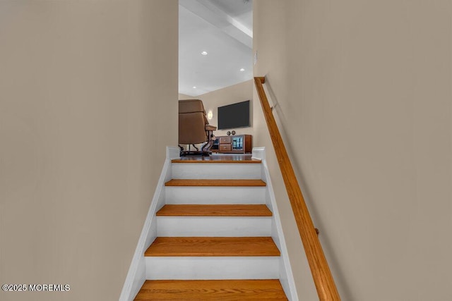 staircase featuring recessed lighting