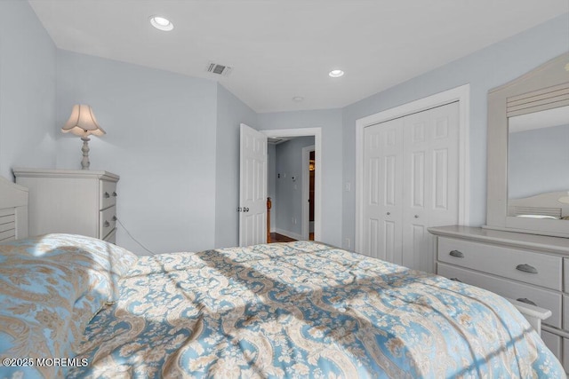 bedroom featuring a closet and recessed lighting