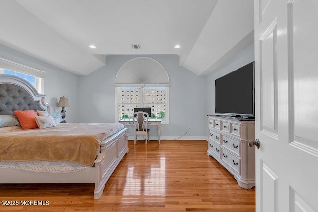 bedroom featuring lofted ceiling, light wood-style flooring, baseboards, recessed lighting, and an office area