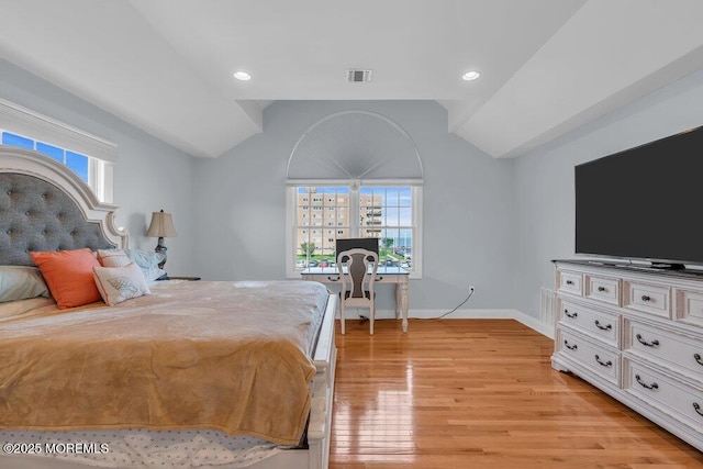 bedroom featuring lofted ceiling, light wood-style flooring, baseboards, and recessed lighting