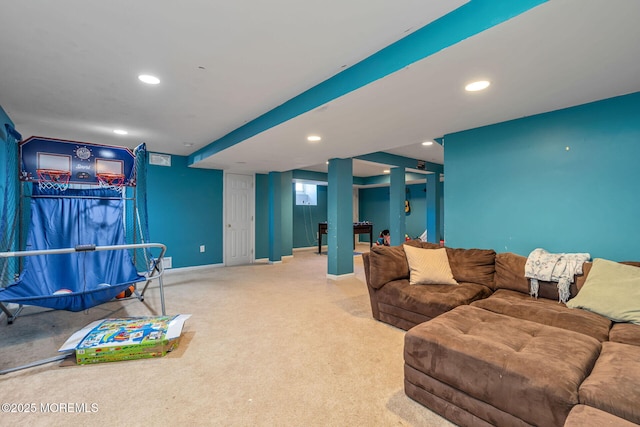 carpeted living room featuring recessed lighting and baseboards