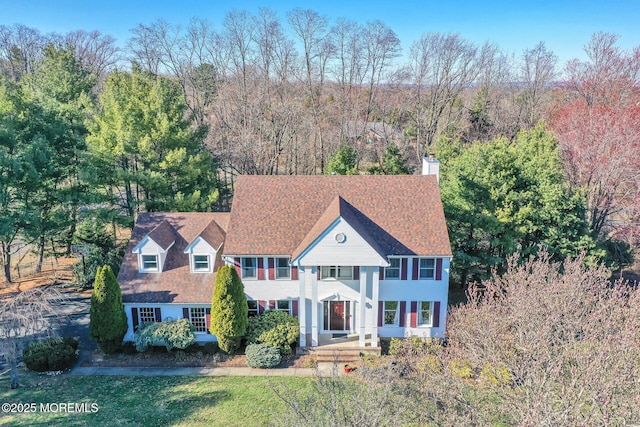 view of front of house with a chimney