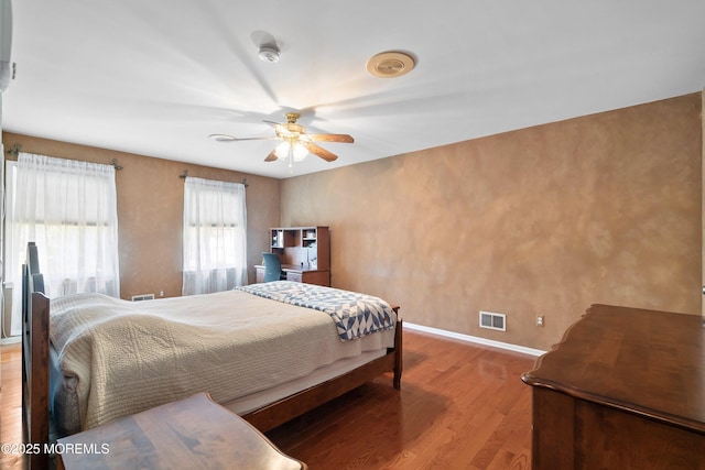 24 Statesboro Rd, Freehold, NJ 07728 - bedroom with wood finished floors, baseboards, and a ceiling fan