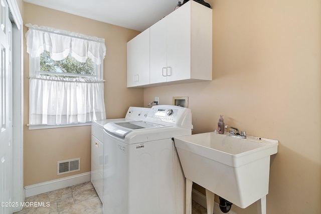 24 Statesboro Rd, Freehold, NJ 07728 - laundry area featuring independent washer and dryer, cabinet space, and baseboards