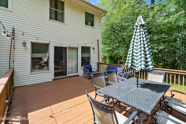 24 Statesboro Rd, Freehold, NJ 07728 - wooden terrace featuring outdoor dining area
