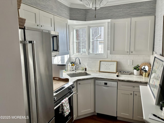 21 Mount St Unit C-1, Bay Head, NJ 08742 - kitchen with appliances with stainless steel finishes, a sink, crown molding, decorative backsplash, and light stone counters