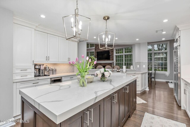 3 Ardmore Pl, Holmdel, NJ 07733 - kitchen with tasteful backsplash, white cabinets, and recessed lighting