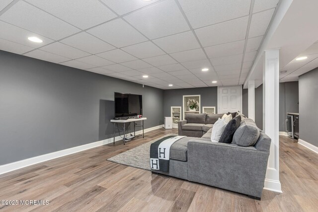 3 Ardmore Pl, Holmdel, NJ 07733 - living area featuring baseboards, wood finished floors, a drop ceiling, and recessed lighting