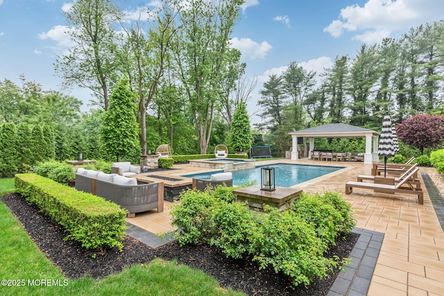 swimming pool featuring a gazebo, an in-ground hot tub, and a patio