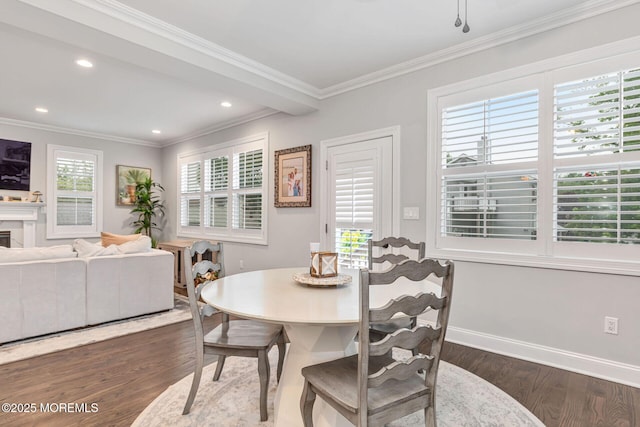 dining space featuring dark wood-style flooring, crown molding, baseboards, and recessed lighting