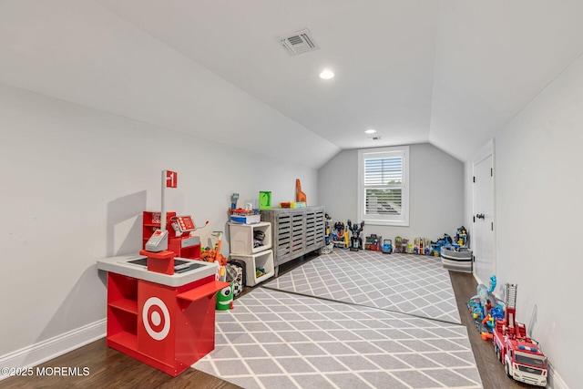game room featuring vaulted ceiling, wood finished floors, baseboards, and recessed lighting